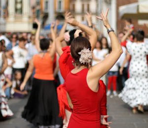 flamenco dancers expert and Spanish dance with elegant period costumes